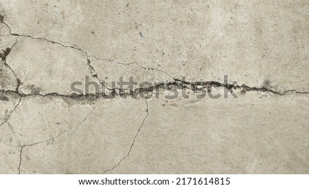 Cracked cement floor or cracked cement wall