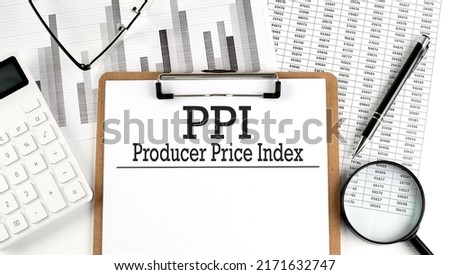 Paper with PPI -PRODUCER PRICE INDEX table on charts, business concept Royalty-Free Stock Photo #2171632747