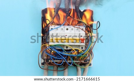 Faulty wiring led to an electrical fire as result of short circuit. Royalty-Free Stock Photo #2171666615