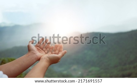 Christian man with open hands worship christian. Eucharist Therapy Bless God Helping Repent Catholic Easter Lent Mind Pray. Christian concept background. nature background.. Royalty-Free Stock Photo #2171691557