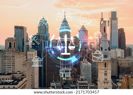 Aerial panoramic cityscape of Philadelphia financial downtown, Pennsylvania, USA. City Hall Clock Tower, sunset. Hologram of legal icons. The concept of law, order, regulations and digital justice.