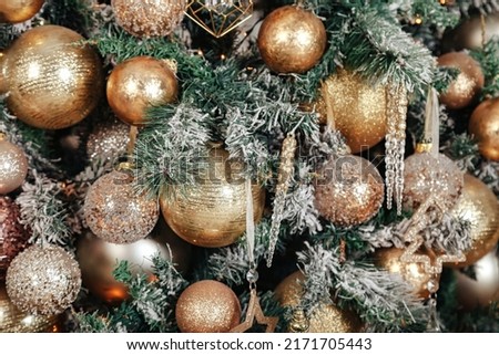 Christmas and new year decor background, decorated christmas tree close up in living room at home. Copy space 
