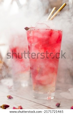 Cold drink ovshala. Refreshing summer pink lemonade. Rose cocktail. vertical position Royalty-Free Stock Photo #2171721465