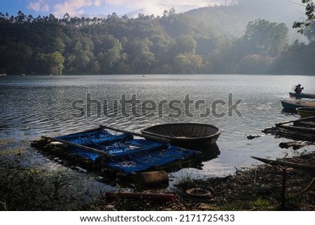 Coracle Ride in Mattupetty Dam, Munnar, Kerala, India Royalty-Free Stock Photo #2171725433