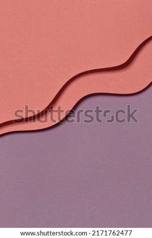 Abstract creative colored paper geometry composition background in pink and and purple colors with curved lines