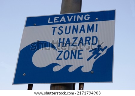 Close up photo of Leaving Tsunami Hazard Zone sign