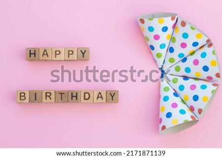Birthday party banner with corner border on a pink background.