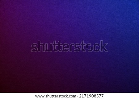  Deep purple blue abstract background. Gradient. Toned fabric surface texture. Dark colorful background with space for design. Combination of plum eggplant color and navy blue.                        