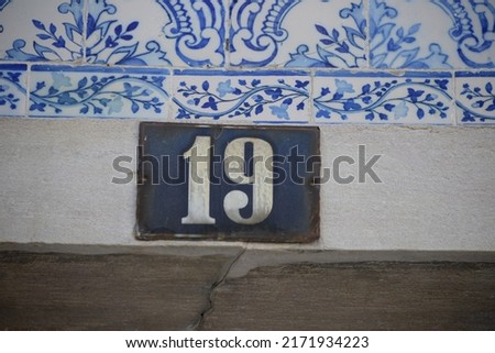 number 19  on a house, Lisbon –Lisboa-, Portugal, September 10, 2018