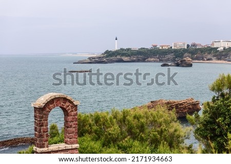 Picturesque view of Biarritz coastline from Rocher Jargin Rocks on blurry day over Biscay Bay, Pyrenees-Atlantiques department, French Basque Country