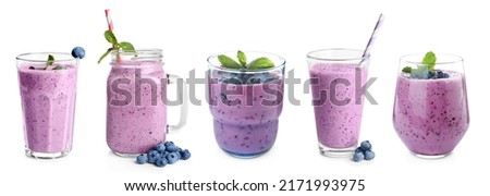 Set with delicious blueberry smoothies on white background. Banner design Royalty-Free Stock Photo #2171993975