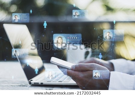 Online recruitment application and one day specialist search service concept with virtual cards with rating and profile information on smartphone in man hands and laptop background, double exposure