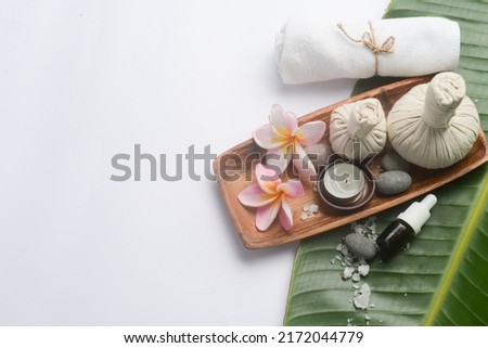 Spa bath set with healthy objects on big leaf 

