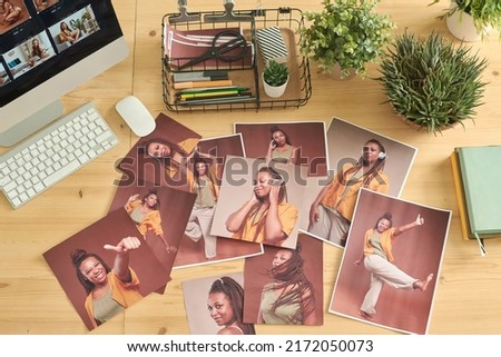 Retouched photos on editor workplace