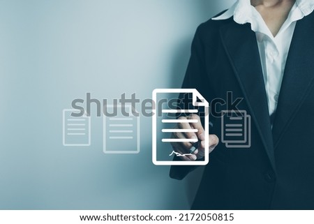 Businesswoman using a pen to sign electronic documents via the Internet, Work from home concept, remote work, new normal office, access to document with secret code or encode, identity verification