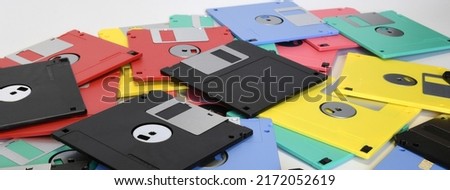colored floppy diskettes isolated on white, long banner