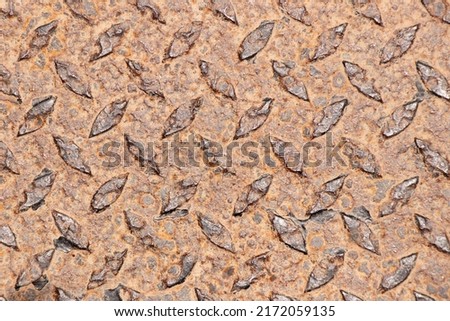 Non-slip metal with red color rust textured background