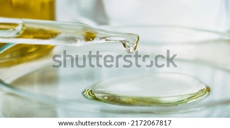 Oil dropping, Laboratory and science experiments, Formulating the chemical for medical research, Quality control test of petroleum industry products concept. Royalty-Free Stock Photo #2172067817