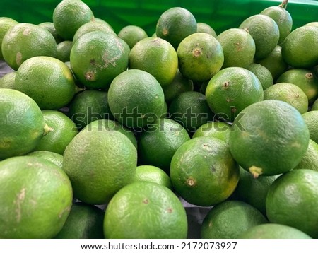 Fresh Lime Citrus Fruits In Fruit Market.