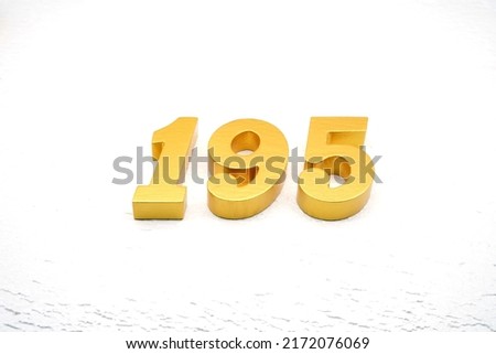   Number 195 is made of gold-plated teak, 1 cm thick, laid on a white painted aerated brick floor, giving good 3D visibility.                                       