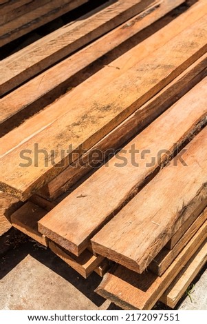 Cocolumber wood planks for sale at a local lumber supply in the Philippines.