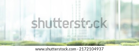 Blurred images of glass wall with city town background.modern abstract window for banner design Royalty-Free Stock Photo #2172104937