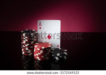 Successful win with ace playing card in poker game. Chips and card on the table.