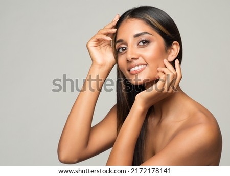 Beauty Woman Face Skin Care. Happy Smiling Indian Girl Portrait over Gray. Diversity Beautiful Women. Body Care and Facial Lifting Treatment Cosmetics Royalty-Free Stock Photo #2172178141
