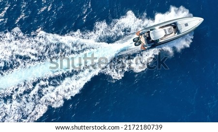 Aerial drone photo of  luxury inflatable rib speed boat cruising in mediterranean deep blue sea Royalty-Free Stock Photo #2172180739