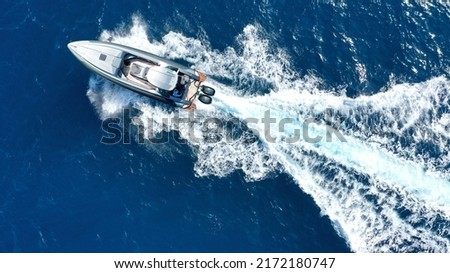Aerial drone photo of  luxury inflatable rib speed boat cruising in mediterranean deep blue sea Royalty-Free Stock Photo #2172180747