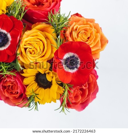 Bouquet of yellow flowers, anemones and sunflowers