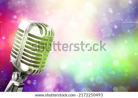 Retro Microphone For Karaoke. Retro Mic on De focused Abstract Background