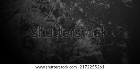 Scary black grunge goth design. horror black background. Scary dark walls, slightly light black concrete cement texture for background. Royalty-Free Stock Photo #2172255261