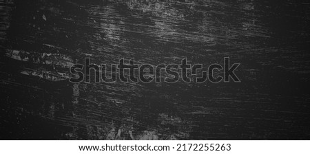 Scary black grunge goth design. horror black background. Scary dark walls, slightly light black concrete cement texture for background. Royalty-Free Stock Photo #2172255263