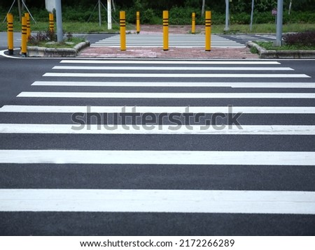 Crosswalk in black and white on road