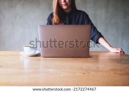 Closeup image of a businesswoman working on laptop computer