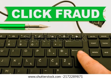 Conceptual caption Click Fraud. Conceptual photo practice of repeatedly clicking on advertisement hosted website Computer Keyboard And Symbol.Information Medium For Communication.