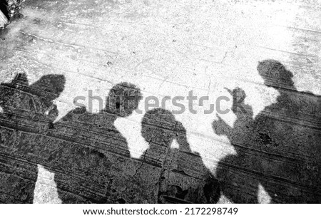 photo of human shadow in monochrome in the morning