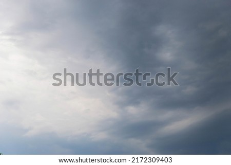 Natural background, dark sky before rain, cloudy weather.