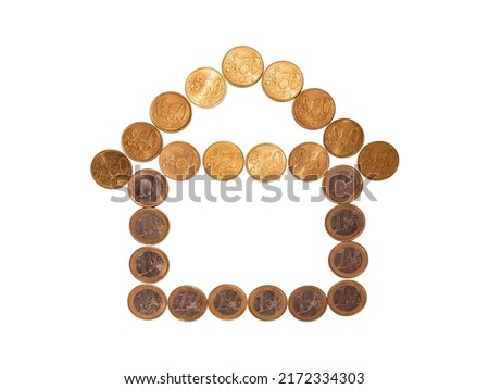 House in the form of one euro and fifty cent coins. Symbol of home loans, mortgages and real estate financing. Currency of the European Union. 