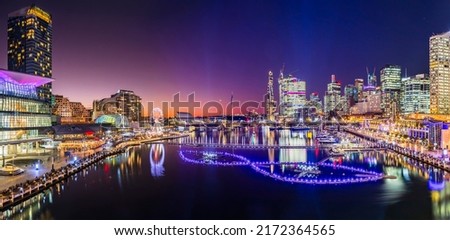 Short bright sunset panorama of Darling harbour Cockle bay in Sydney city CBD at Vivid Sydney light festival show. Royalty-Free Stock Photo #2172364565