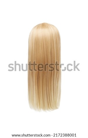 Close-up shot of a female headband wig of long blond straight hair. The wig of long blond hair is isolated on a white background. Black view.