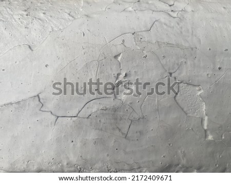 Blisters, cracks, white wall paint, soft tones, used for background images and abstract illustrations
