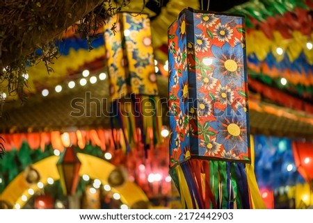 Colorful flags and decorative balloon for the Saint John party, which takes place in June in northeastern Brazil. Royalty-Free Stock Photo #2172442903