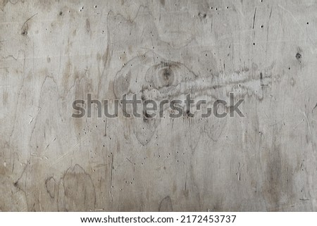 Light wooden background. Scratched wooden wall. Worn wood texture.