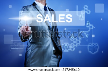 Business man working on digital virtual screen press on button sales