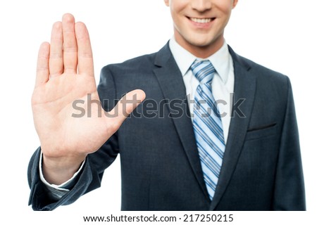 Cropped image of man refusing an offer with stop gesture