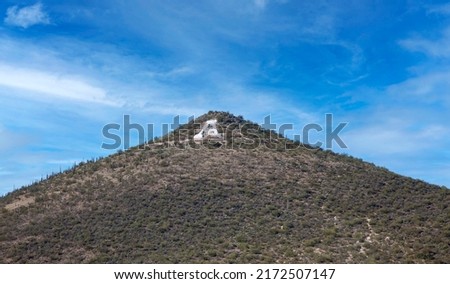 Tucson's “A” Mountain or Sentinel Peak, is a popular local landmark, hiking trail and park. Royalty-Free Stock Photo #2172507147