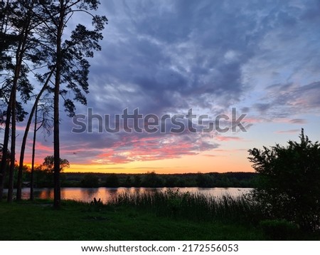 crimson sunset over the lake