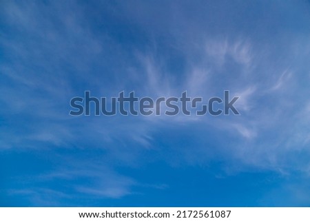 Blue sky cirrus clouds. Natural beautiful scene.